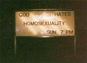 Photo of sign saying "God Hates Homosexuality"